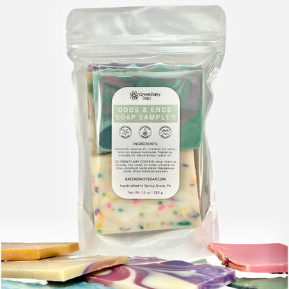 Soap sampler pack with visible soaps and Green Daisy Soaps branding on a white background